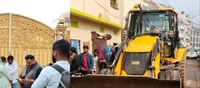 Bulldozer runs on the house of the brother of accused, Congress MLA protests